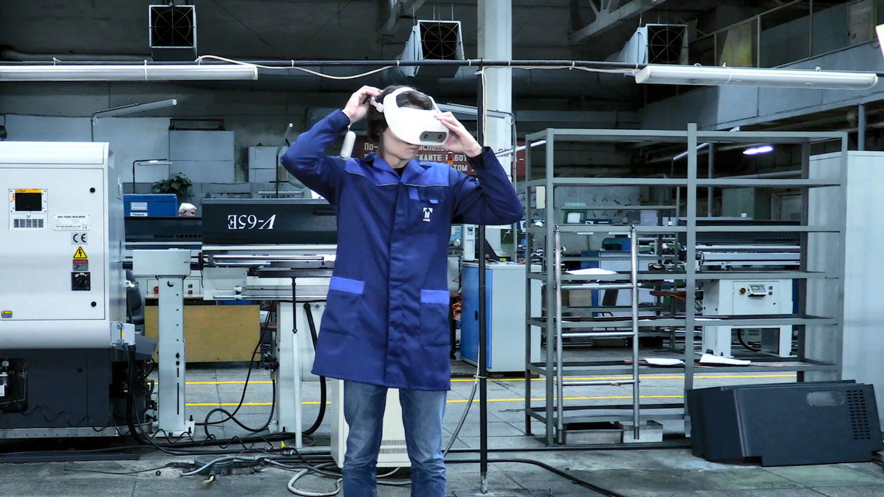 Having put on a VR headset, a trainee is transferred into a fully immersive and interactive environment.